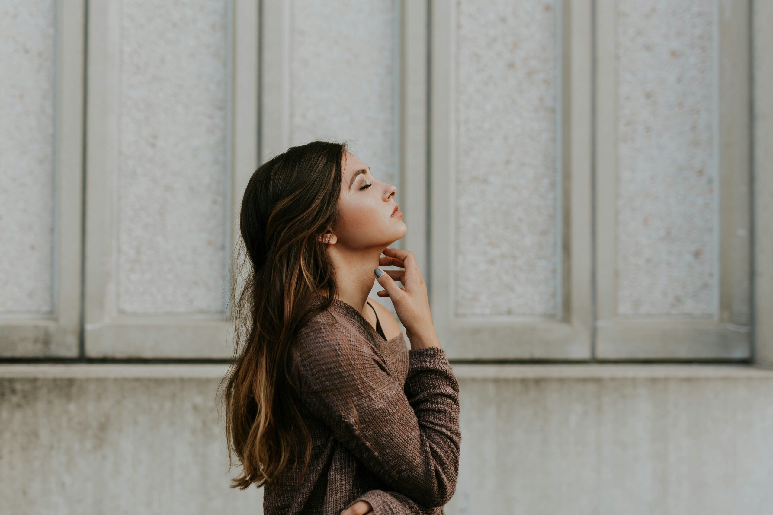 a woman looking emotional reminding you that you don't need to break down to break through